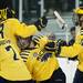Michigan sophomore defenseman Brennan Serville celebrates after scoring his first career goal in the third period of the game against Western Michigan on Saturday. The Wolverines won 2-0. Daniel Brenner I AnnArbor.com